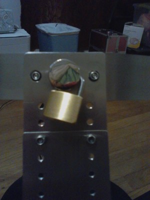 Horrible locking system at waistband. the two &quot;posts&quot; on the sides of the center one are nothing more than tiny screws with locking nuts that fit into the holes of the waistband post holes. This does not prevent the tails of the waistband from coming up and swiveling