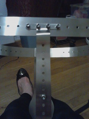 rear view of how rear solid strap attaches to waistband: it has 4 little screws with locking nuts...definitely needing permanent riveting once you have your waistband adjusted!!!