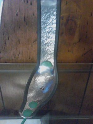 See this curve? Too tight on the top of the front shield that curves down around the mons venus, too loose at the bottom where the rear cable attaches. These two points need to be corrected for proper fit.